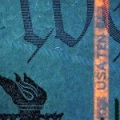 Fluorescence reveals a colored strip in the US $10 bill